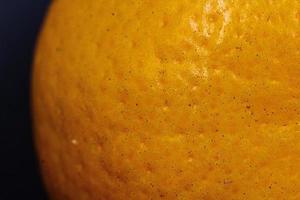 Haut Orangen Mandarin . Textur schließen hoch. foto