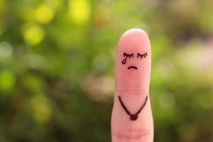 Finger Kunst von einsam Frau ist Weinen. foto