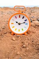 Uhr im das Sand foto