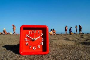 Uhr im das Sand foto