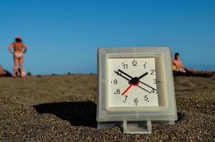 Uhr im das Sand foto