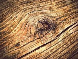 Detail aus altem Holz mit Knoten foto