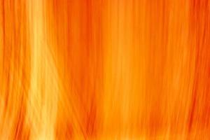 hell Orange Hintergrund mit klein Vertikale Wellen und Höhepunkte. abstrakt Hintergrund zum Design. foto