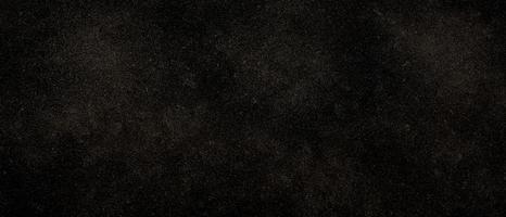 Grunge Rau schwarz betrübt Lärm Korn Textur. schwarz Granit Platten Hintergrund. Schnee auf schwarz Hintergrund. schwarz Hintergrund mit Weiß funkeln. Rau dunkel Wand, Grunge Textur foto