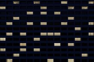3D-Gebäudefassade bei Nacht foto
