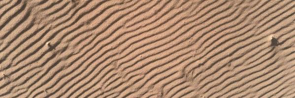 Wüste Sand Textur mit Linie Muster, oben Aussicht foto