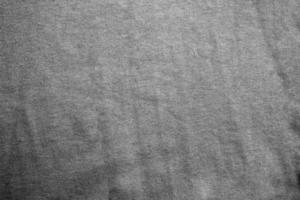Blau grau Stoff Textur Hintergrund. ein Stück von Baumwolle Stoff ist vorsichtig gelegt aus auf das Oberfläche. Textil- Textur. foto