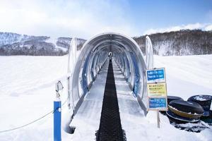 Skifahren Rolltreppe oder ziehen um Gehweg foto