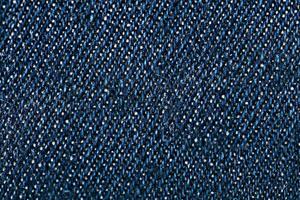 Uniform Textur von Denim dunkel Blau Stoff foto