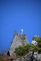 Berg oben Kreuz foto