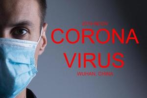 Mann mit Schutzmaske. Neues Coronavirus 2019-ncov aus China foto