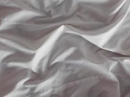 Detail eines weißen Bettlaken foto