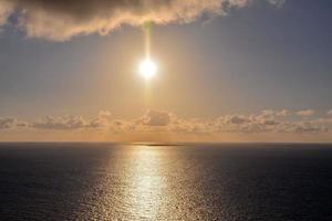 Sonnenuntergang über dem Meer foto