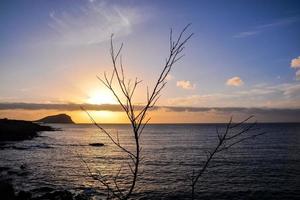 Sonnenuntergang über dem Meer foto