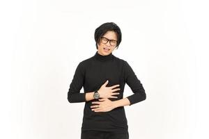 Leiden Magenschmerzen Geste von gut aussehend asiatisch Mann isoliert auf Weiß Hintergrund foto