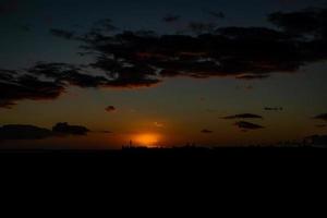 bunt Sonnenuntergang auf das Spanisch Insel von gran Canaria im das Maspalome Dünen foto