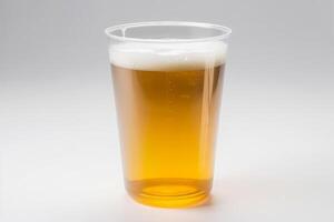 Glas von Bier im ein Plastik Becher auf ein Weiß Hintergrund erstellt mit generativ ai Technologie. foto