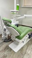 Dental Stuhl grün. Dental Behandlung. foto
