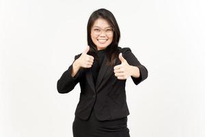 zeigen Daumen oben von schön asiatisch Frau tragen schwarz Blazer isoliert auf Weiß Hintergrund foto