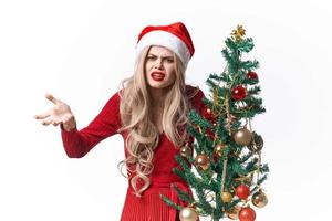 heiter Frau Urlaub Spielzeuge Weihnachten Baum Dekoration Spaß foto