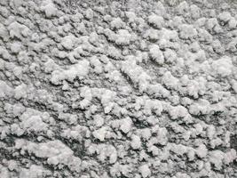 Textur von frisch schneebedeckt Stoff Winter Schnee Hintergrund foto