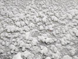 Textur von frisch schneebedeckt Stoff Winter Schnee Hintergrund foto