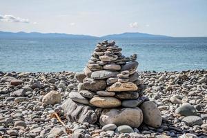 inukshuk auf das Strand foto