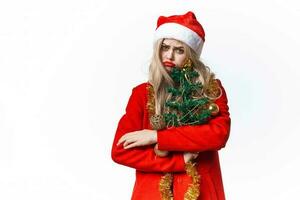 Frau gekleidet wie Santa Weihnachten Baum Dekoration Urlaub foto