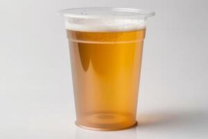 Glas von Bier im ein Plastik Becher auf ein Weiß Hintergrund erstellt mit generativ ai Technologie. foto