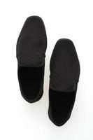 schwarze Schuhe auf weißem Hintergrund foto
