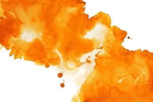 Orange Aquarell Hand Gemälde und Spritzen abstrakt Textur auf Weiß Papier Hintergrund foto