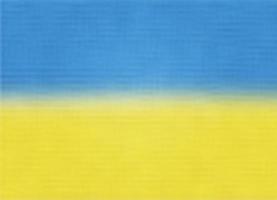 ukrainisch Flagge mit abstrakt Stoff Textur foto