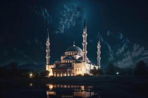 schön Muslim Moschee Aussicht beim Nacht mit schön wolkig Himmel. Truthahn-Stil islamisch Moschee Design mit ein schön See. Muslim Gebet Ort. schön Moschee glühend beim Nacht. generativ ai. foto