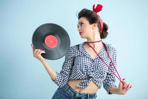 retro Frau mit Musik- aufzeichnen. foto