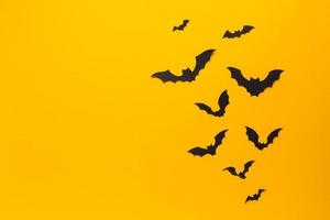 Halloween Fledermäuse mit orange Hintergrund foto