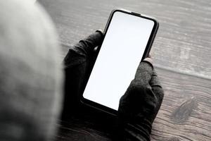 Hackerhand stiehlt Daten vom Smartphone foto