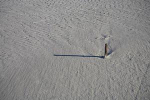 Sonnenuhr Sand Hintergrund foto