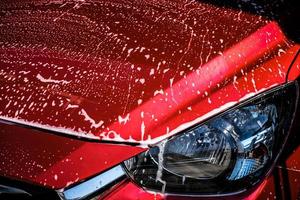 Auto waschen Scheinwerfer und Reinigung Ausrüstung Auto waschen mit rot Auto zum Reinigung Qualität Kunde Ausstellungsraum von Bedienung Transport Automobil Transport Automobil Auto Fabrik foto