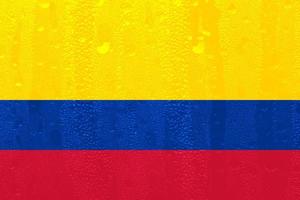 3d Flagge von Kolumbien auf ein Glas foto