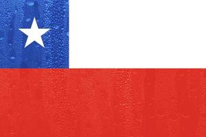 3d Flagge von Chile auf ein Glas foto