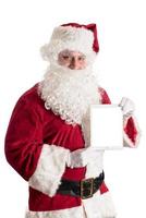 Santa claus mit Tablette foto