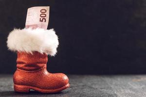 Santa Stiefel mit Geld foto