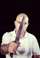 Mann mit Messer foto