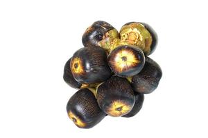 Grog Palme reifen Obst ist dunkel braun oder schwarz mit ölig Haut. Fruchtfleisch ist undurchsichtig zu Gelb mit Reife. das Schalen und Fruchtfleisch sind benutzt zu machen Grog Palme Kuchen und zu schmücken verschiedene Dessert Farben. foto