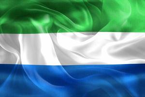 3d-illustration einer sierra leone-flagge - realistische wehende stoffflagge foto