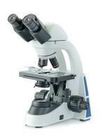 Mikroskop isoliert auf weißem Hintergrund foto