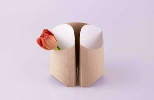 drei grau Behälter zum Französisch Fritten mit ein Tulpe auf ein Rosa Hintergrund foto
