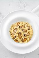 Portion Risotto mit Champignons foto