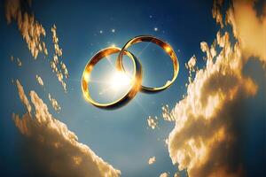 ein Paar von Gold Hochzeit Ringe schwebend im das Himmel. zwei Hochzeit Ringe schwebend im das Wolken mit ein Sonne im das Hintergrund und ein Blau Himmel mit Wolken unten ihnen. generativ ai. Hochzeit Konzept. foto