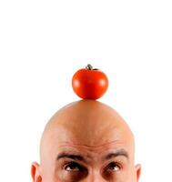 erschrocken Mann mit Tomaten foto